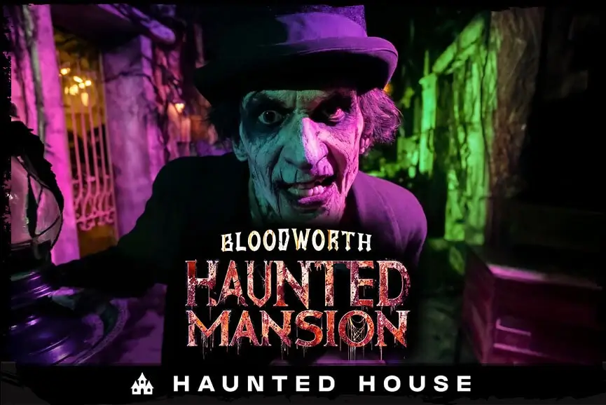 Ghastly butler outside Bloodworth Haunted Mansion attraction.