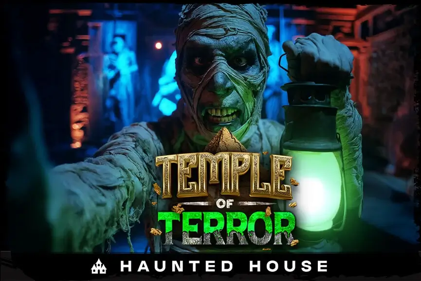 Mummy guardian glaring in Temple of Terror haunted house hallway.
