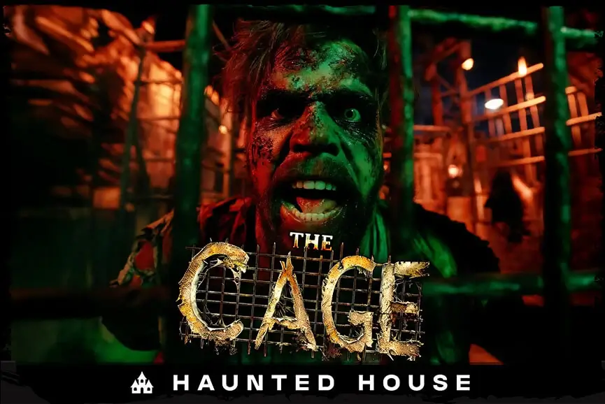 Infected prisoner snarling behind bars in The Cage biohazard haunt.